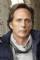 William Fichtner as Tommy Dundee