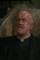 Frank Kelly as John Smith