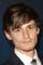 Giles Matthey as 
