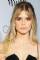 Carlson Young as 
