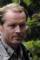 Iain Glen as Stan