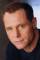 Jason Beghe as 