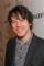 John Gallagher Jr. as Jim Harper