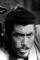 Toshiro Mifune as Sutekichi the Thief