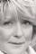 Helen Atkinson Wood as Mrs. Miggins, a coffee shoppekeeper