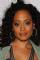 Essence Atkins as Charity