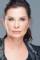 Jane Badler as 