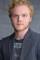 Joe Adler as 