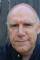 John Rackham as 