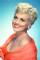 Judy Holliday as 