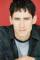 Steven K. Perry as Businessman