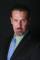 Mark Vasconcellos as Garrett