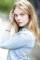 Nell Hudson as 