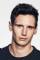 Cory Michael Smith as Roger Chaffee