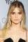 Carlson Young as Angela Yearwood