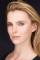 Betty Gilpin as 