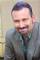Mark Benjamin as Scott Landry
