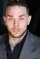 Nicholas Simon as 
