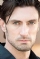 John Wells as 